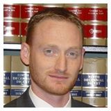 J Travis Barnett